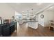 Expansive kitchen with granite countertops, stainless steel appliances, and center islands at 9398 W Mirror Rd, Columbus, IN 47201