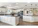 Well-equipped kitchen with stainless steel appliances, granite counters, and modern design at 9398 W Mirror Rd, Columbus, IN 47201