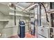 Basement area featuring essential utilities and shelving for storage at 9715 Mallery Dr, Noblesville, IN 46060