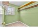 Walk-in closet with built-in shelving and ample storage space at 9715 Mallery Dr, Noblesville, IN 46060