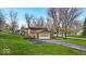 Inviting home featuring a brick facade, attached garage, and a well-maintained lawn, perfect for suburban living at 9715 Mallery Dr, Noblesville, IN 46060