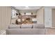 Cozy living room showcasing a brick fireplace, neutral walls, and a comfortable seating area at 9715 Mallery Dr, Noblesville, IN 46060