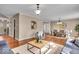 Open-concept living room flowing into the dining area, filled with natural light at 9715 Mallery Dr, Noblesville, IN 46060