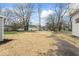Spacious backyard featuring a grassy area and potential for landscaping at 1049 N Traub Ave, Indianapolis, IN 46222