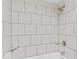 A bright shower with tiled walls and a modern shower head at 1049 N Traub Ave, Indianapolis, IN 46222