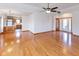 Hardwood floors in an open floor plan, adjacent to kitchen, dining and foyer at 1114 Woodridge, Brownsburg, IN 46112