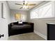 Cozy bedroom featuring a ceiling fan, a daybed, and natural lighting at 1240 Wayne St, Noblesville, IN 46060