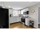 Bright kitchen featuring stainless steel appliances, granite counters, and ample storage, ideal for cooking and entertaining at 1240 Wayne St, Noblesville, IN 46060