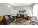 Inviting living room showcasing stylish sofas, neutral paint, and a decorative rug at 1240 Wayne St, Noblesville, IN 46060