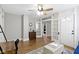 Comfortable living room with French doors and ample natural light with hardwood floors at 1240 Wayne St, Noblesville, IN 46060