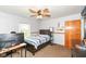 Cozy bedroom featuring a dark wood bed, and natural light at 1400 W Cowing Dr, Muncie, IN 47304