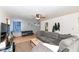 Open-concept living area with a neutral color scheme and artwork at 1400 W Cowing Dr, Muncie, IN 47304