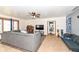 Inviting living room with neutral tones, a ceiling fan, and closet at 1400 W Cowing Dr, Muncie, IN 47304