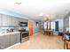 Open layout combining the kitchen and dining area, creating a spacious feel with great flow at 1400 W Cowing Dr, Muncie, IN 47304