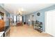 Open concept space featuring a kitchen, dining area, and doorway to the living room at 1400 W Cowing Dr, Muncie, IN 47304