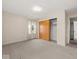 Bright bedroom with carpet, window, closet and neutral decor at 1418 E Maple Dr, Shelbyville, IN 46176