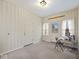Home office features paneling and multiple windows at 1418 E Maple Dr, Shelbyville, IN 46176