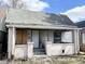 Exterior of a home featuring a covered front porch and visible house number at 1437 Kappes St, Indianapolis, IN 46221