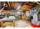 Basement with table and stairs, perfect for storage at 15 N Fleming St, Indianapolis, IN 46222