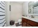 Bathroom featuring a vanity with a mirror, toilet, and a shower with a patterned curtain at 15638 River Birch Rd, Westfield, IN 46074