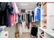 Walk-in closet with hanging storage, shelving, and lots of personal clothing items at 15638 River Birch Rd, Westfield, IN 46074