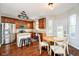 Eat-in kitchen featuring stainless steel appliances, island, and pendant lighting at 15638 River Birch Rd, Westfield, IN 46074