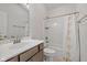 Bathroom with combination tub and shower and modern single sink at 17301 Dallington St, Westfield, IN 46074