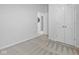 Bedroom with neutral carpet and paint, showcasing spacious closet and open doorway at 17301 Dallington St, Westfield, IN 46074