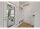 Bright entryway with convenient mudroom featuring built-in bench and screened-in porch access at 17301 Dallington St, Westfield, IN 46074