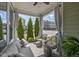 Inviting outdoor patio area with comfortable seating, stylish decor, and neighborhood views at 17301 Dallington St, Westfield, IN 46074