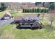 Beautiful brick home with a welcoming front porch and a detached two-car garage at 195 Hess Rd, Martinsville, IN 46151