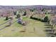 Serene property featuring a home, separate garage, and well-manicured trees and lawns at 195 Hess Rd, Martinsville, IN 46151