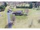 Charming home with a detached garage, front porch, and beautiful landscaping at 195 Hess Rd, Martinsville, IN 46151