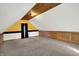 Finished attic space featuring a neutral color scheme, carpeting, and wood trim at 195 Hess Rd, Martinsville, IN 46151