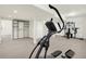 Spacious finished basement area is well-lit and includes home gym equipment and storage at 195 Hess Rd, Martinsville, IN 46151
