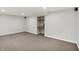 Finished basement with carpet, drop ceiling, and media niche at 195 Hess Rd, Martinsville, IN 46151