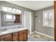 Bathroom featuring granite vanity, tile floor, and natural light at 195 Hess Rd, Martinsville, IN 46151