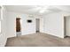 Spacious bedroom with ceiling fan, closet, and wall mounted TV at 195 Hess Rd, Martinsville, IN 46151
