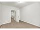 Carpeted bedroom with view to closet space offers neutral decor and cozy ambiance at 195 Hess Rd, Martinsville, IN 46151