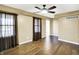 Spacious bedroom with hardwood flooring, a ceiling fan and neutral paint at 195 Hess Rd, Martinsville, IN 46151
