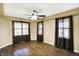 Bright bedroom features hardwood floors, ceiling fan, and ample natural light at 195 Hess Rd, Martinsville, IN 46151