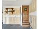 Unfinished garage with wooden shelves, 'Personal cave' door, and concrete floors at 195 Hess Rd, Martinsville, IN 46151