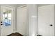 Hallway with a closet and entry to the porch at 195 Hess Rd, Martinsville, IN 46151