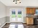 Bright kitchen with a view of the backyard through French doors at 195 Hess Rd, Martinsville, IN 46151