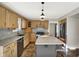 Updated kitchen featuring an island with breakfast bar and stainless steel appliances at 195 Hess Rd, Martinsville, IN 46151