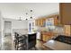 Well-equipped kitchen features a center island, modern appliances, and access to the backyard through glass doors at 195 Hess Rd, Martinsville, IN 46151