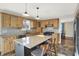 Updated kitchen featuring an island with breakfast bar and stainless steel appliances at 195 Hess Rd, Martinsville, IN 46151