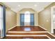 Bright living room featuring wood floors, a vaulted ceiling, and a window with light-filtering curtains at 195 Hess Rd, Martinsville, IN 46151