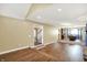 Expansive living area featuring hardwood floors and seamless access to the entry and dining spaces at 195 Hess Rd, Martinsville, IN 46151