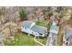 Aerial view of the house and detached garage with a lush green yard at 207 E Ohio St, Mooresville, IN 46158